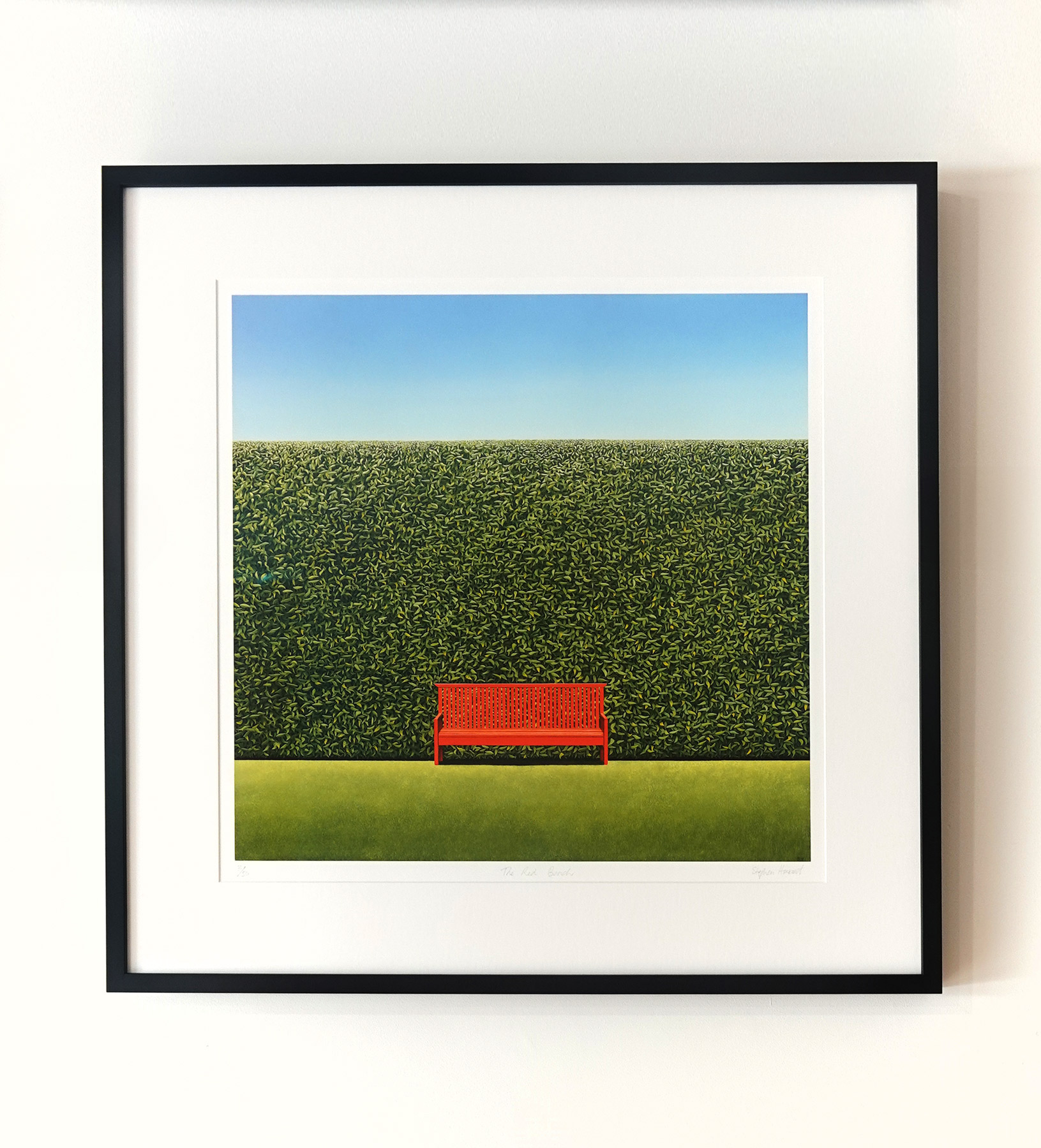 Stephen Howard, giclee print, The Red Bench, framed on the wall at Parnell Gallery. 